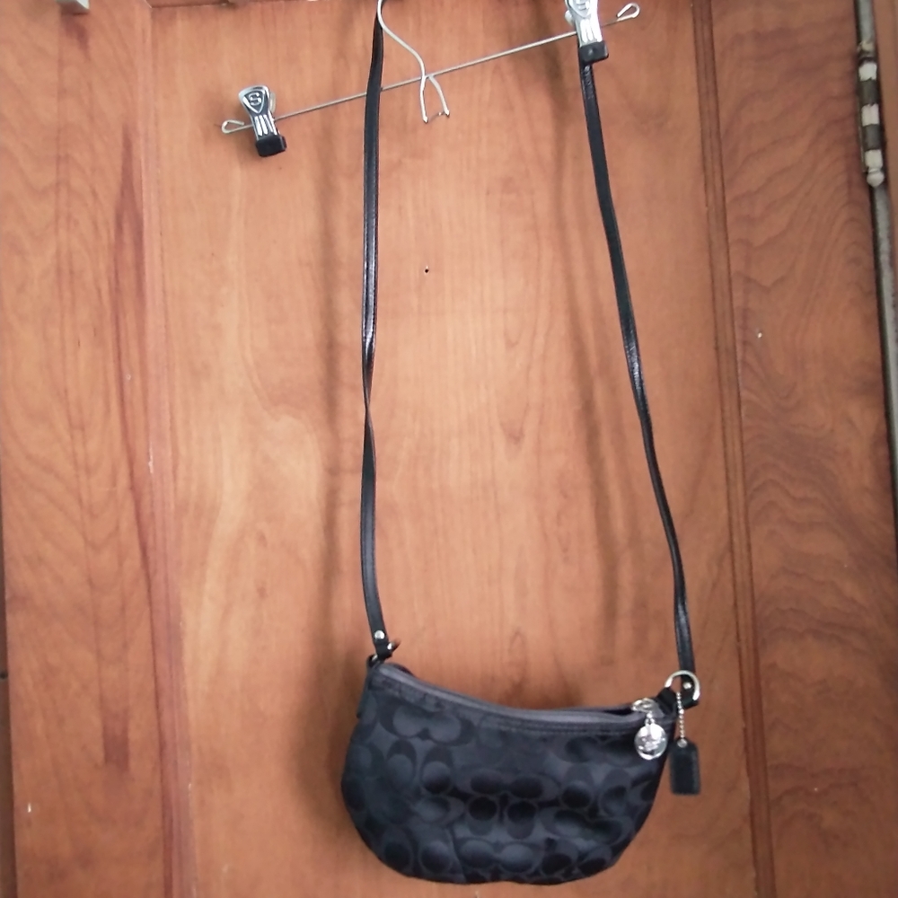 Small black Coach crossbody handbag